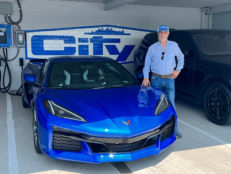 Rick Hendrick City Chevrolet blue Corvette delivery Hendrick Cars.jpg