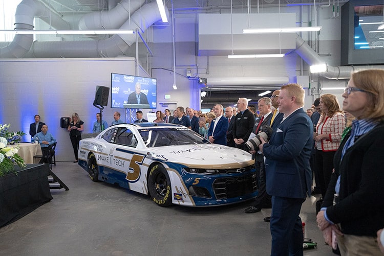 Rick Hendrick at Podium at Wake Tech.jpg