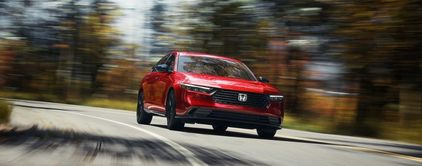 A red 2025 Honda Accord from the front.